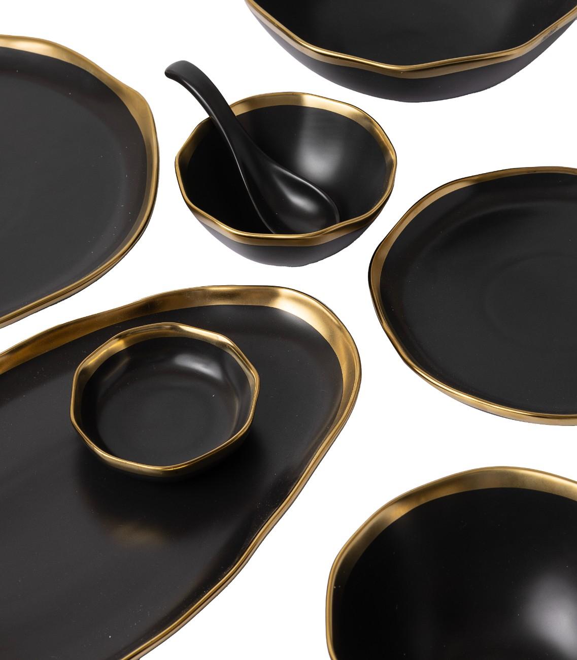 Black dish with gold edge
