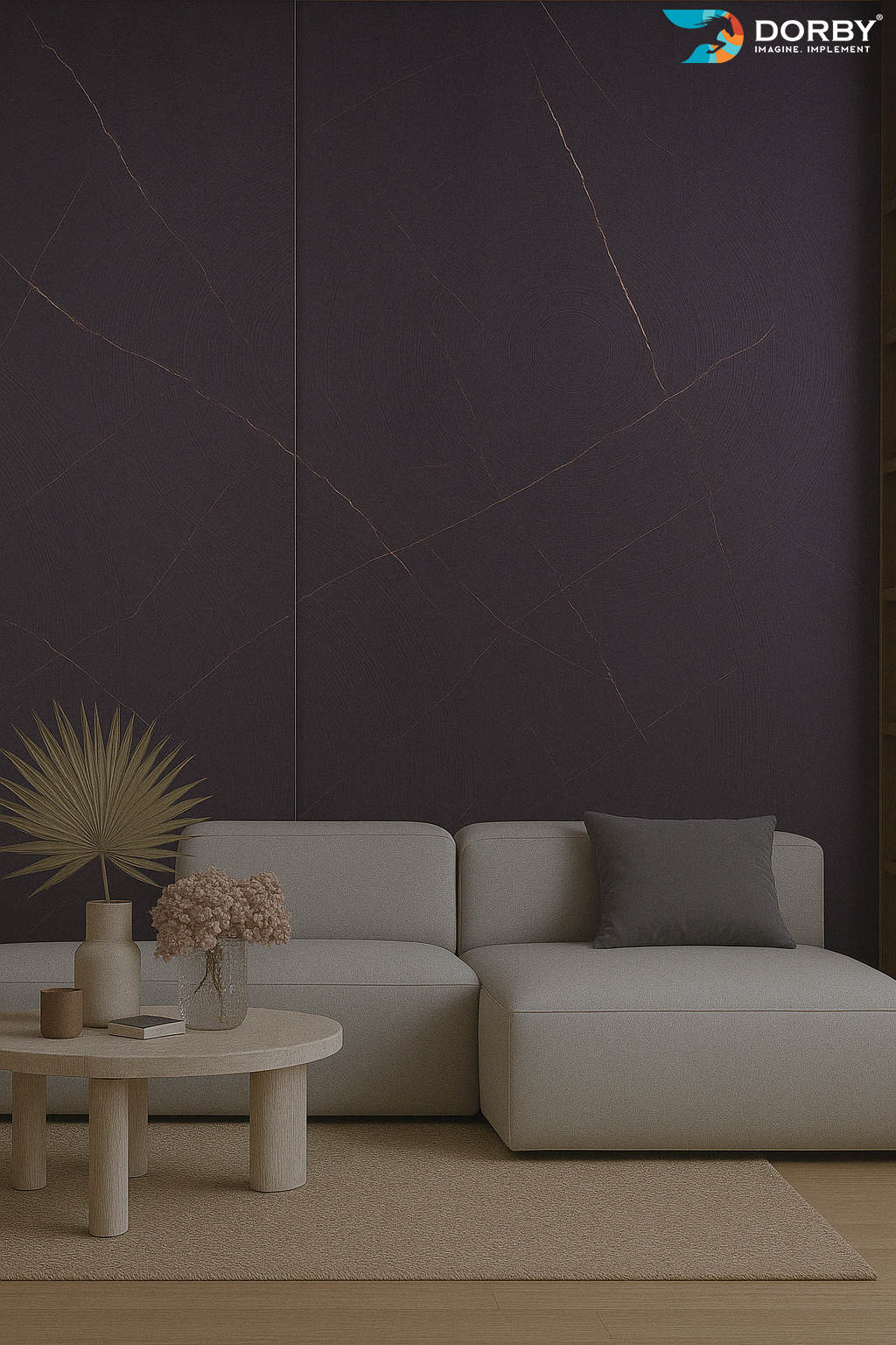 Modern living room with a gray sofa, small table, and decorative items against a dark wall.