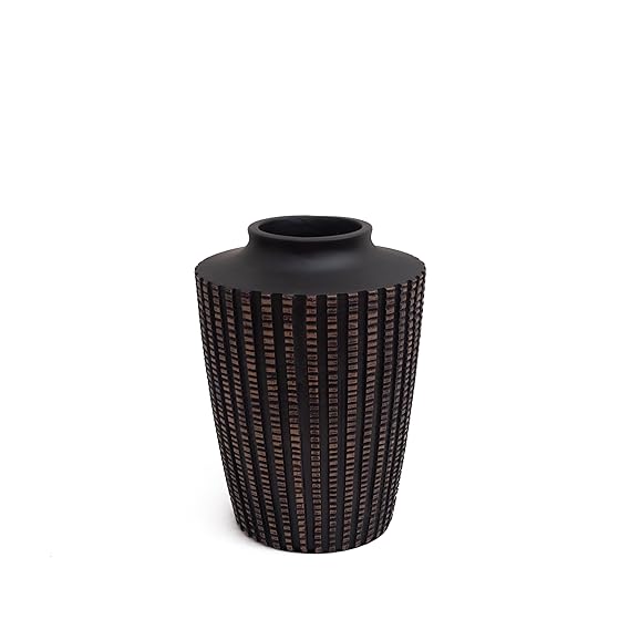 Luxury teak vase detail shot